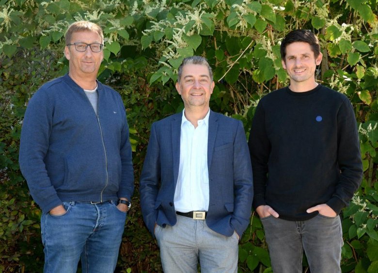 Drei Herren auf dem Foto